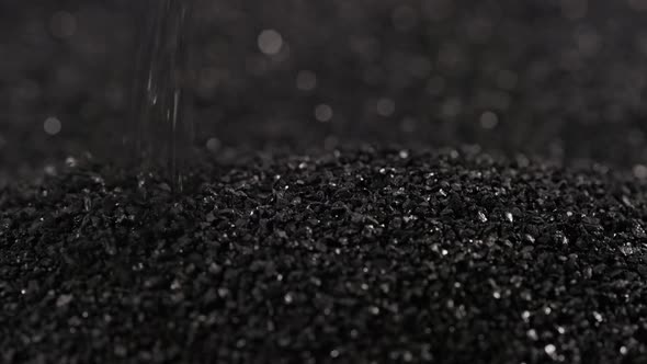 Pouring Black Coconut Charcoal Closeup Slomo Activated Carbon Small Fraction