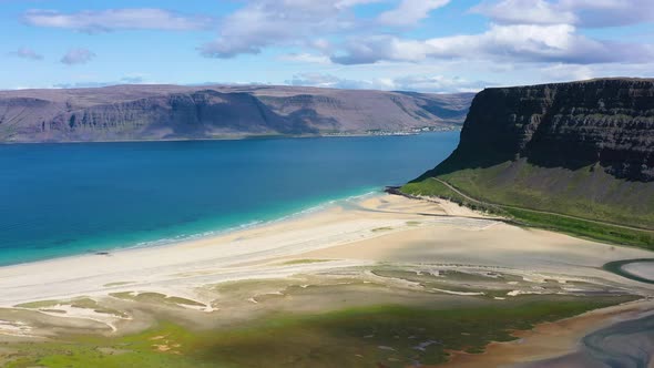 Iceland. Aerial view on the coast, mountains and ocean. Beach and sea from air. alt