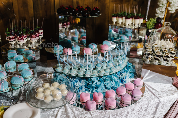 There, delicious candies, cakes and deserts on the table.With