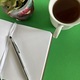 Open notebook and pen with coffee cup and succulent  - PhotoDune Item for Sale