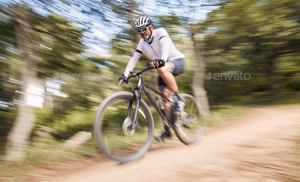 Nature blur mountain bike and sports man cycling action and ride