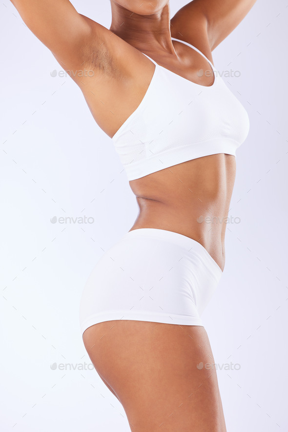 Workout, underwear and body of studio person with results of training,  liposuction or fitness trans Stock Photo by YuriArcursPeopleimages