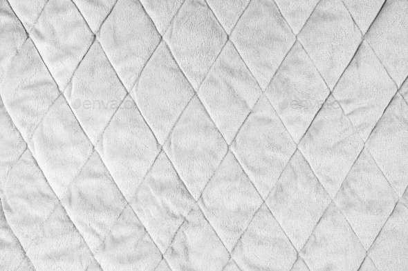 Quilted White Velours Fabric Background, Wrinkled Soft Blanket Surface