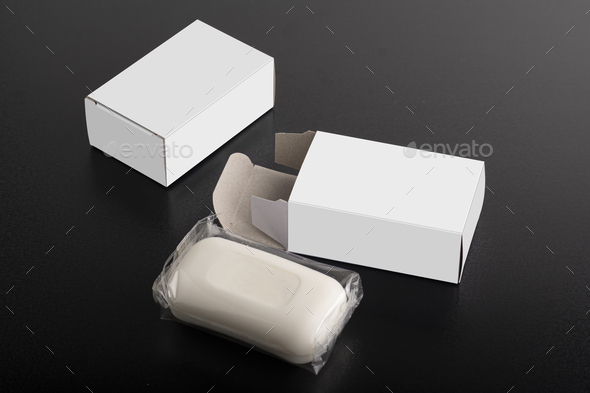 Opened soap package box on black surface, editable mock-up series template ready for your design