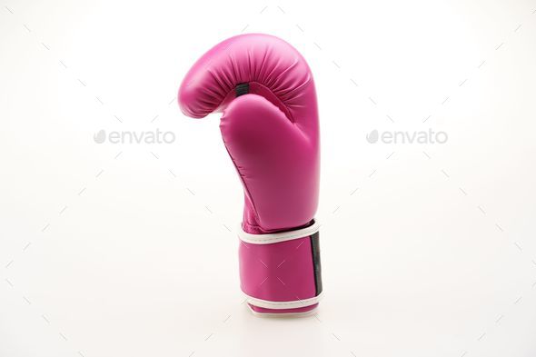 Single pink boxing glove isolated on a white background