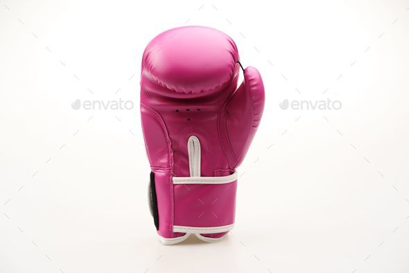 Single pink boxing glove isolated on a white background