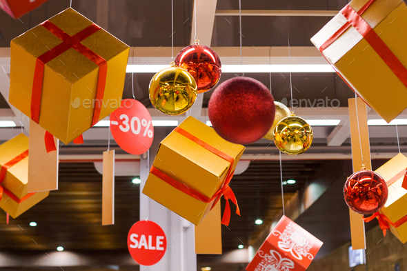 boxes and balls are hung with discount signs