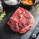 Raw fillet steak beef meat on black table. - PhotoDune Item for Sale