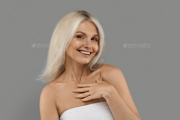 An Older Woman with a Posed on White Background Stock Image