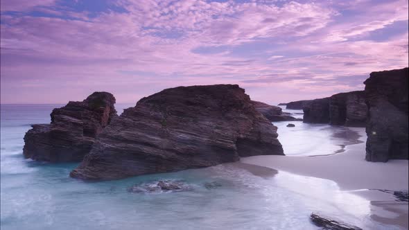 Ocean At Low Tide. Cathedrals Beach In Spain. Timelapse alt