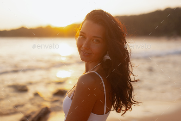 Beautiful Young Woman at Summer Beach. Portrait of Beautiful Woman