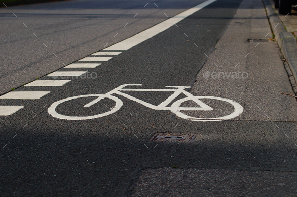 Road marking for a cycle lane Stock Photo by wirestock | PhotoDune