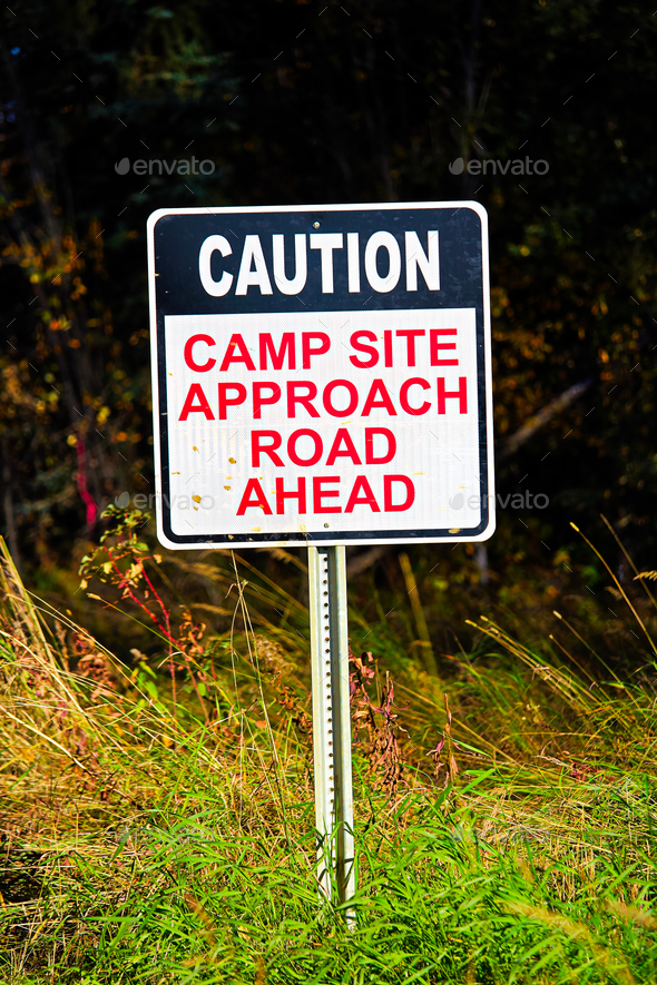 A Caution Camp Site Approach Road Ahead sign