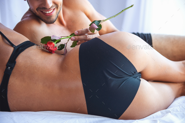 Couple About To Have Sex. Woman And Man In Underwear. Stock Photo