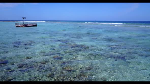 Aerial scenery of relaxing island beach voyage by clear ocean with white sandy background of a dayou alt