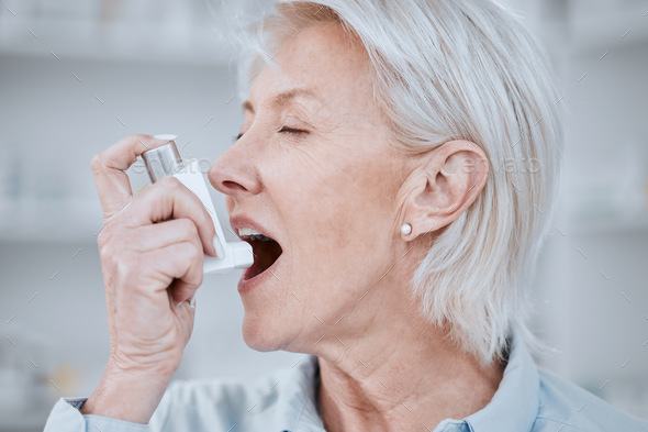 Senior woman, asthma inhaler and pump for pharmaceutical product ...