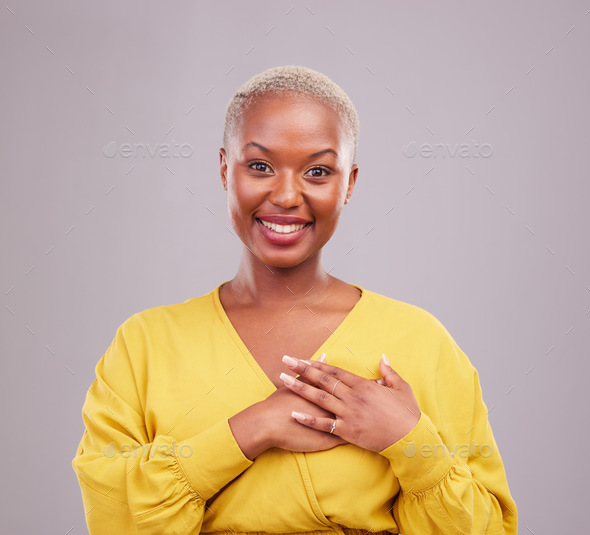 Gratitude, happy and portrait of a black woman in a studio with sweet, kind and positive attitude.