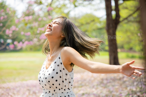 Happy Woman Enjoying Life in the Autumn on the Nature Stock Photo