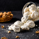 Small white meringues on a dark background - PhotoDune Item for Sale