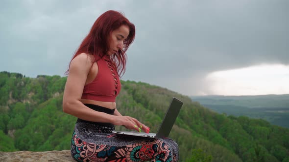 Woman Freelancer Works Laptop on Top Mountain Backdrop Stunning Mountain alt