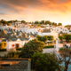 View of the historic center of Alberobello at sunset, vertical - PhotoDune Item for Sale