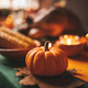 Thanksgiving holiday dinner table setting with fall decoration and pumpkins - PhotoDune Item for Sale