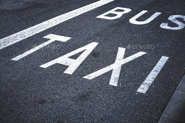 Traffic signs in an exclusive lane for bus and taxi stop area Stock ...