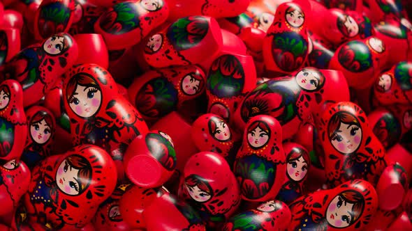 Beautiful handmade matryoshka dolls. A huge number of Babushkas create a stack. alt