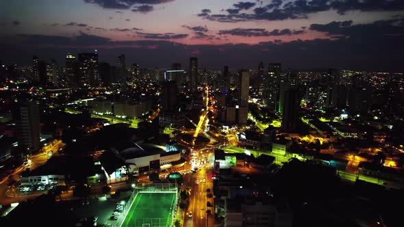 Night scape of famous avenue at downtown Goiania Brazil. alt
