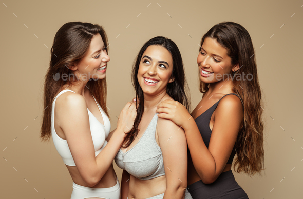 Cheerful young spanish, arab and european women in different underwear  enjoy natural beauty, free Stock Photo by Prostock-studio