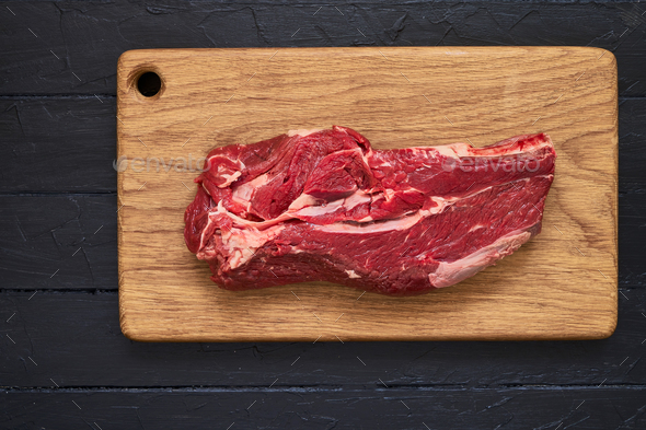 Fresh, raw meat on a cutting board, Stock image