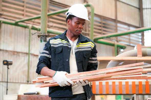 Industrial factory employee working in wooden manufacturing industry ...