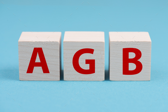 The word AGB is standing on wooden cubes, german language