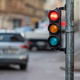 traffic light on the street junction with beautiful bokeh, city with cars in the background - PhotoDune Item for Sale