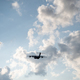 Cargo plane in moody cloudy sky - PhotoDune Item for Sale