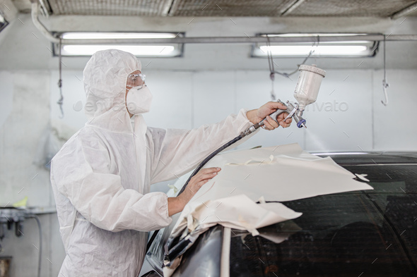 Garage car color repair roof painting wax airbrush coating team staff working in auto workshop