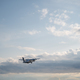 Passenger plane in sky with clouds - PhotoDune Item for Sale