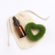 Essential oil with green grass heart.  - PhotoDune Item for Sale