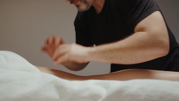 Chiropractor Doing Leg Hip Anti Cellulite Massage. Slim Young Woman Receiving Health Procedure