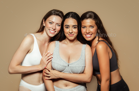 Smiling young arabic, spanish and caucasian women in different