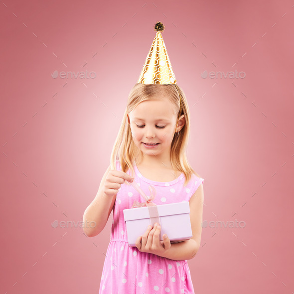 Present, birthday hat and child open gift box for holiday party or happy celebration. Excited girl