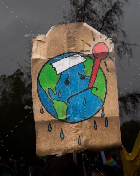 Vertical shot of an environmental protest poster in Glasgow, Scotland