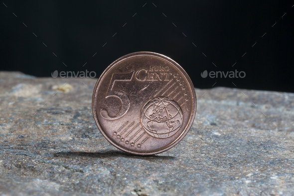 Detail five cent Euro coin, a metal that represents the economy and purchasing power.