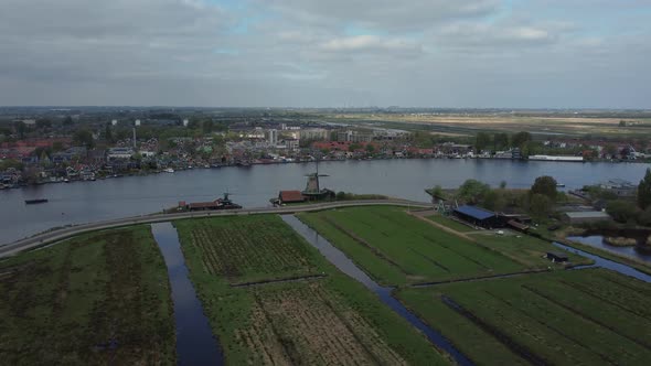 Mills in Holland at the Zaanse Schans. Aerial on a cloudy day alt