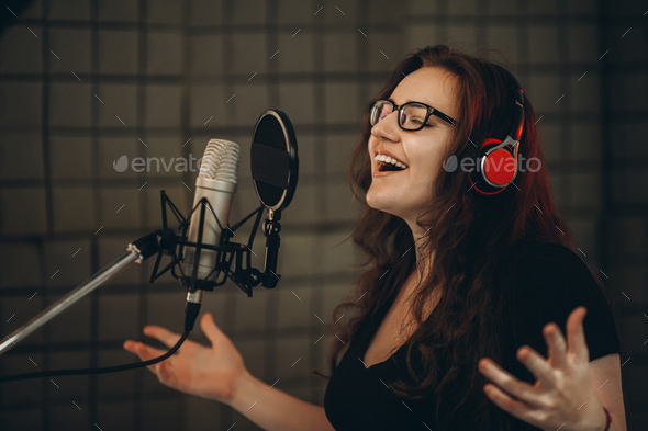 Professional studio microphone over music studio Stock Photo by