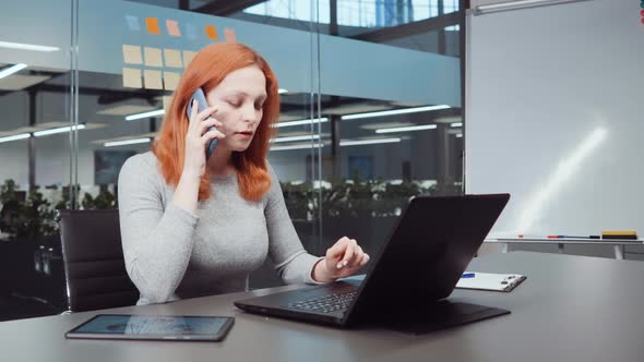 Female Financial Advisor Giving Consultation on Phone alt