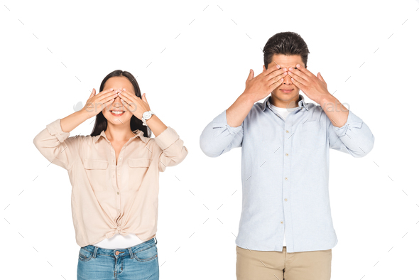 young man and woman showing see no evil gestures isolated on white