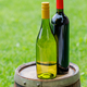 Wine bottles on barrel - PhotoDune Item for Sale