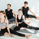 Group of People Meditation Making Sitting Yoga Pose in Luxury