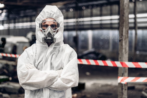 Scientist wear Chemical protection suit check danger chemical